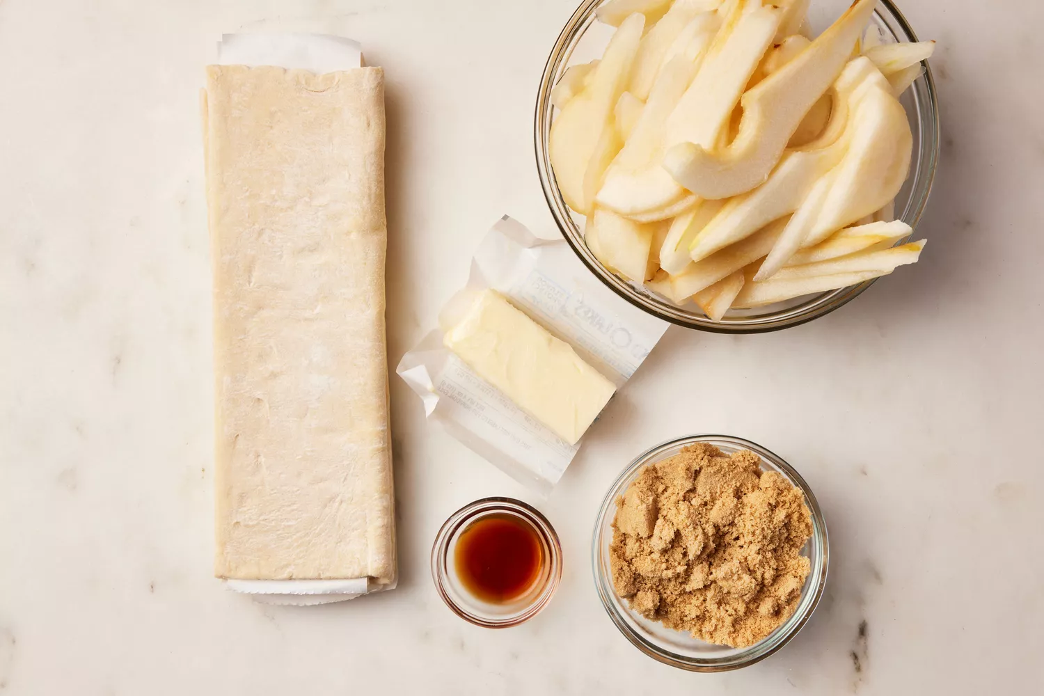 Ingredients to make individual pear tarts