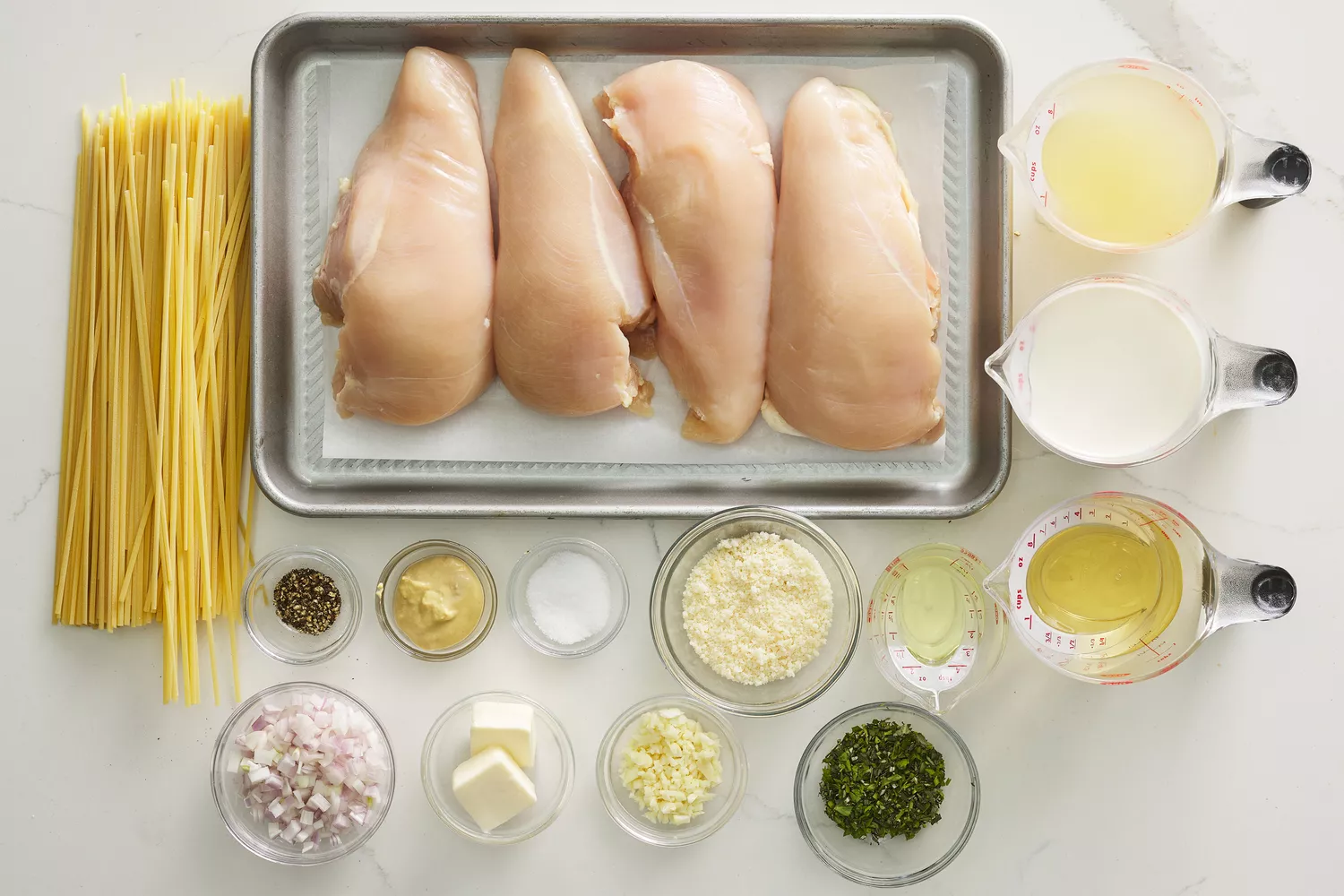 Ingredients to make creamy chicken herb pasta