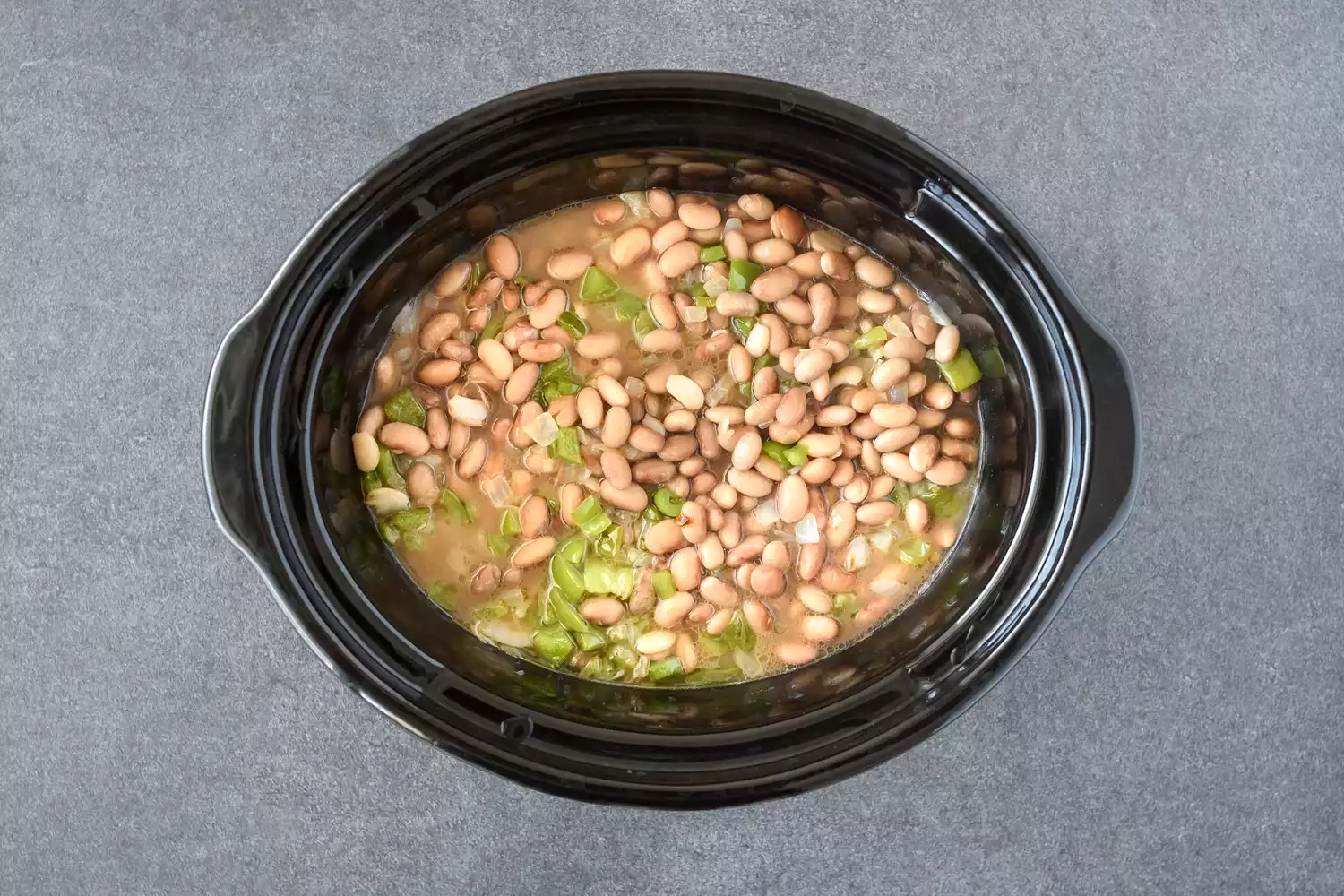 Oignons et haricots dans la mijoteuse