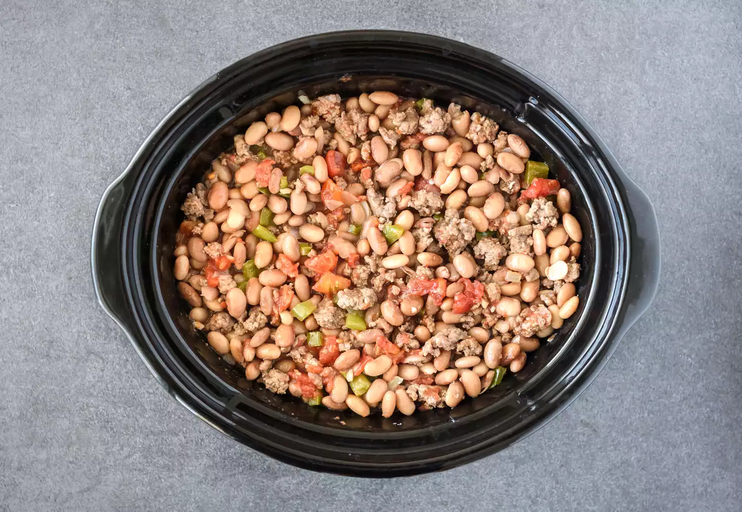 Ajouter tomates et poudre de chili