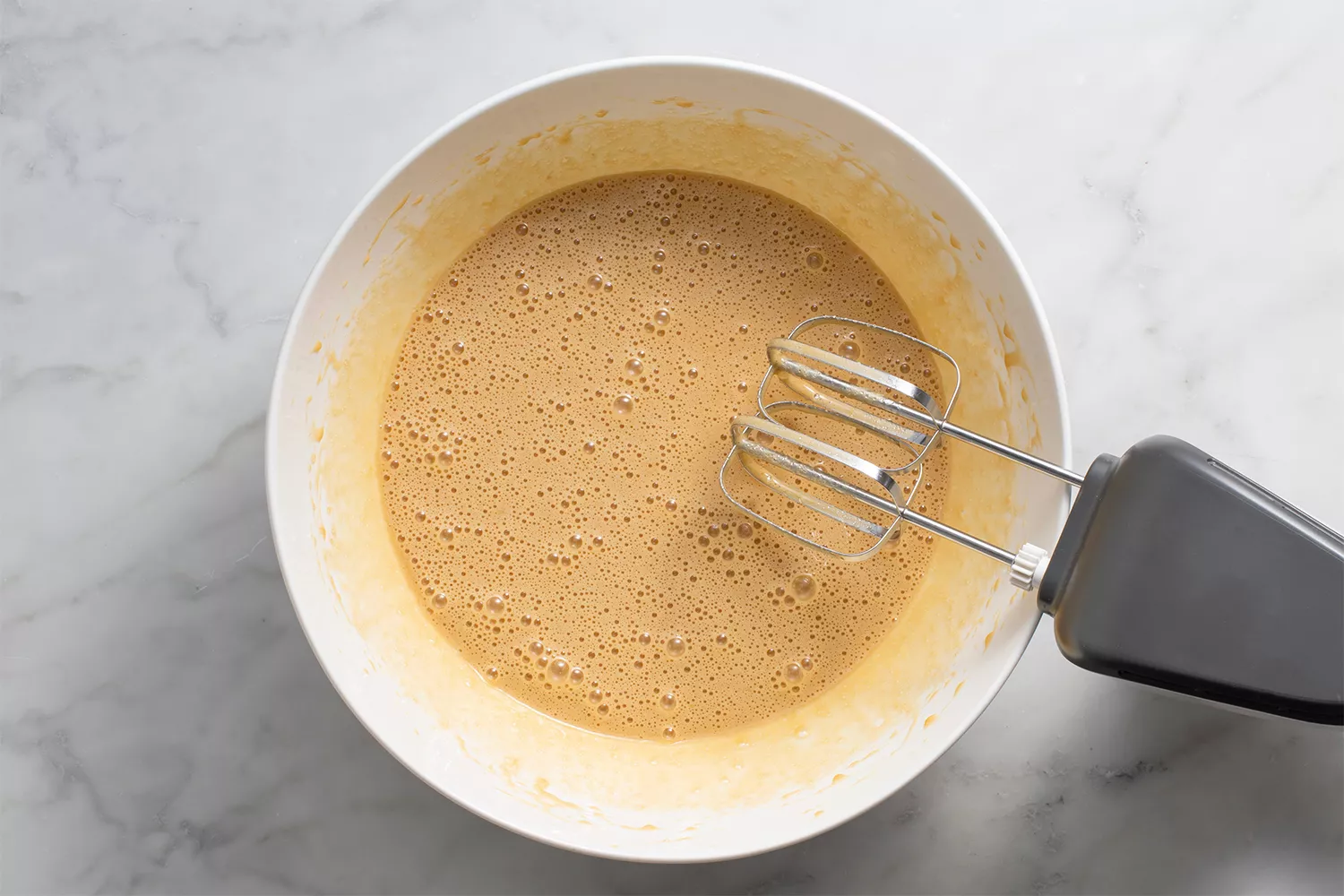 Mélange d'œuf et de sucre