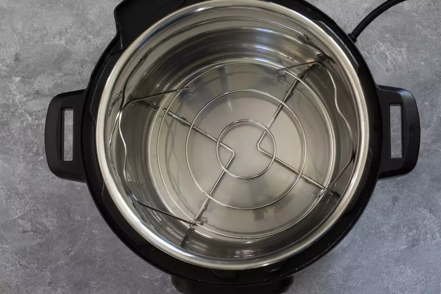 instant pot with trivet and water