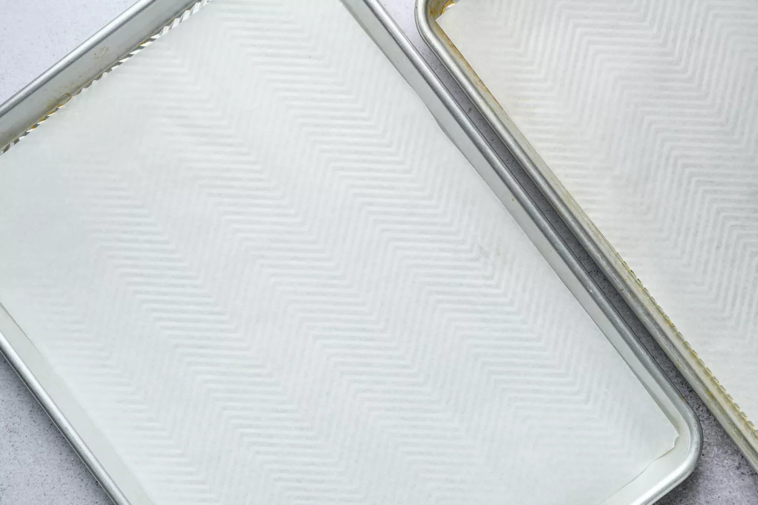 two baking sheets lined with parchment paper
