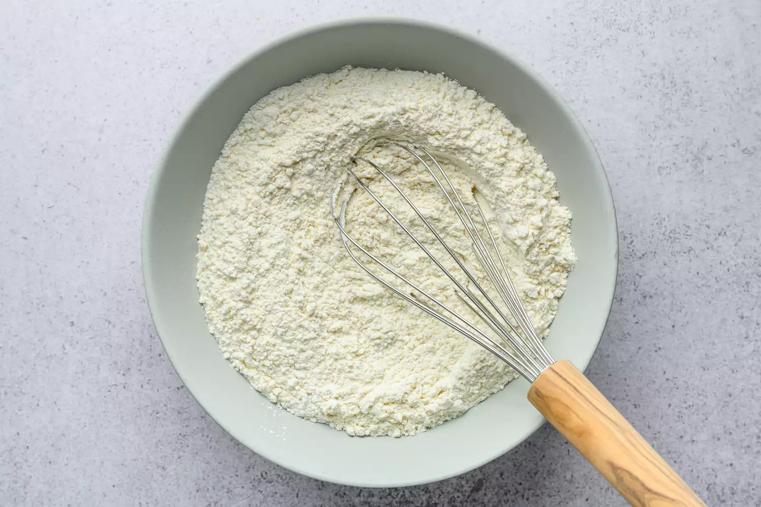 dry ingredients for miso peanut butter cookies whisked together in a bowl