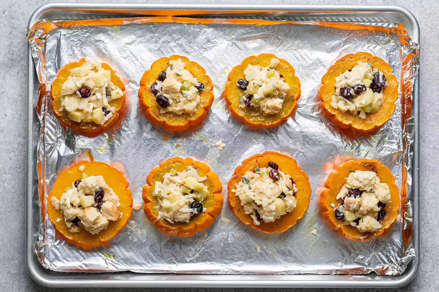 mini pumpkins filled with stuffing mixture
